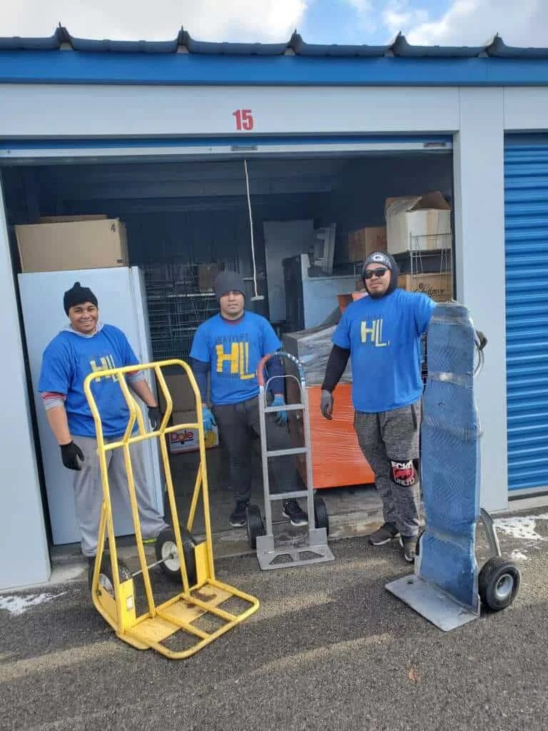 Movers handling large household items